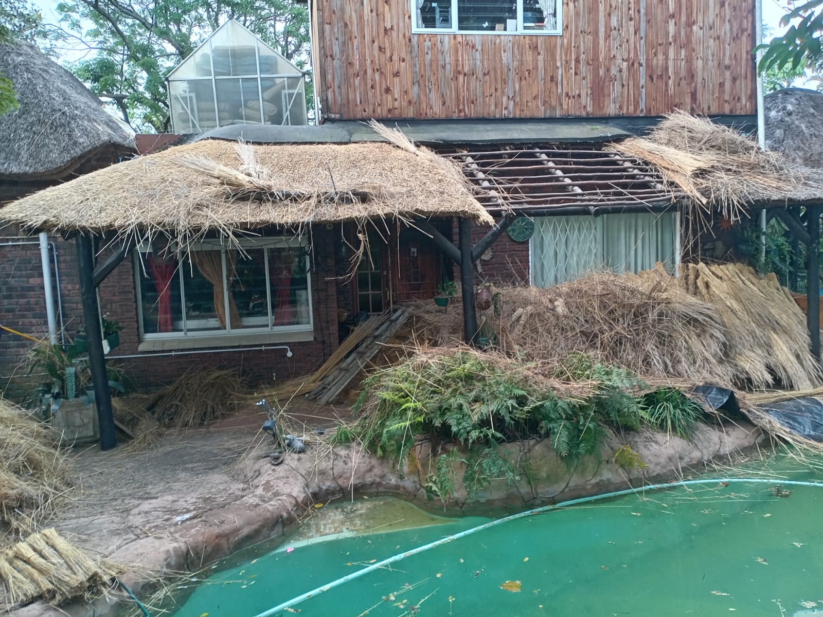 Thatch roof construction in progress